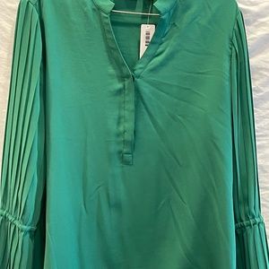 Chico’s 100% silk blouse, new with tag size M